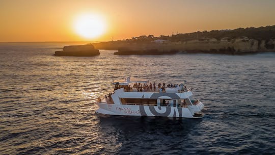 Sunset guided boat trip with secluded beach BBQ from Albufeira